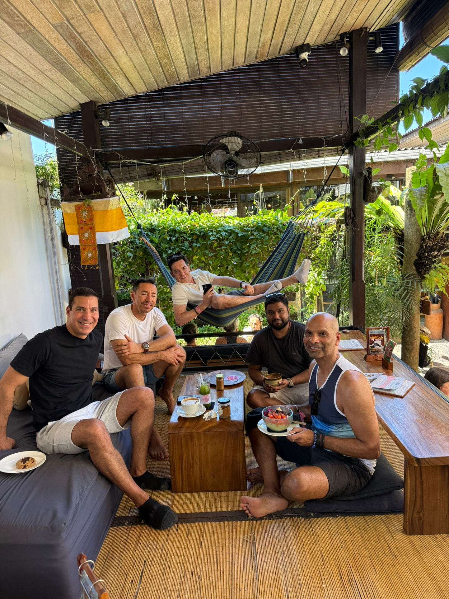 The collective relaxing at a Bali café